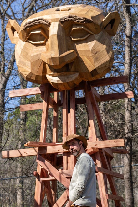 Thomas Dambo oversees construction as his troll begins to take shape at Pease Park on Friday, March 1, 2024. The troll is a public art sculpture made from recycled and reused materials. A celebration for the troll's completion and introduction to the park will be held on March 15.