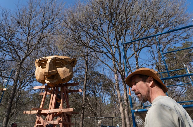 Thomas Dambo oversees construction as his troll begins to take shape at Pease Park on Friday, March 1, 2024. The troll is a public art sculpture made from recycled and reused materials. A celebration for the troll's completion and introduction to the park will be held on March 15.